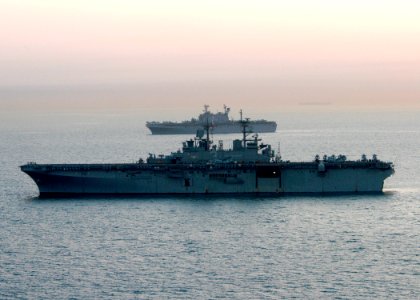 US Navy 040707-N-2972R-036 Sailors and Marines prepare for flight operations aboard the amphibious assault ship USS Kearsarge (LHD 3) to transport elements of the 24th Marine Expeditionary Unit (MEU) to the Kuwait Naval Base