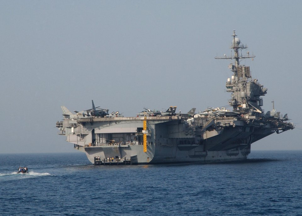 US Navy 040722-N-4374S-006 A Rigid Hull Inflatable Boat (RHIB) assigned to conventionally powered USS John F. Kennedy (CV 67) returns with British Sailors from the frigate HMS Somerset (F 82)