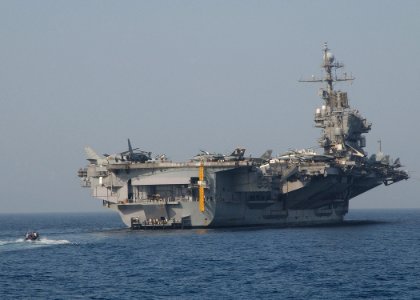 US Navy 040722-N-4374S-006 A Rigid Hull Inflatable Boat (RHIB) assigned to conventionally powered USS John F. Kennedy (CV 67) returns with British Sailors from the frigate HMS Somerset (F 82)