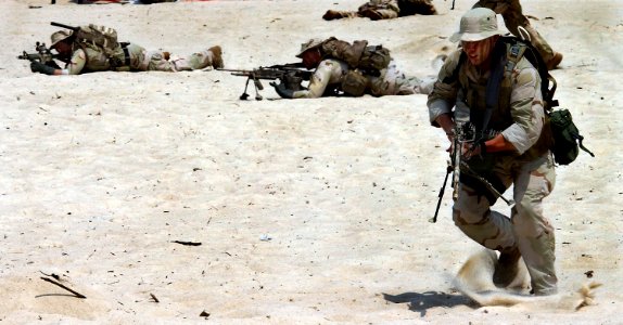 US Navy 040717-F-6340W-366 U.S. Navy SEALs (Sea, Air, Land) seize a beach during a weekend demonstration show