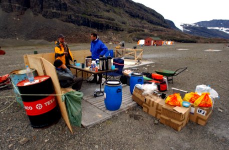 US Navy 040805-N-0331L-001 Members assigned to a Navy recovery team eat breakfast before heading out to examine the wreckage of LA-9 a Navy P-2V Neptune aircraft