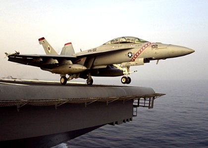 US Navy 040728-N-3488C-003 An F-A-18F Super Hornet assigned to the Diamondbacks from Strike Fighter Squadron One Zero Two (VFA-102) prepares to launch off the flight deck of USS Kitty Hawk (CV 63)