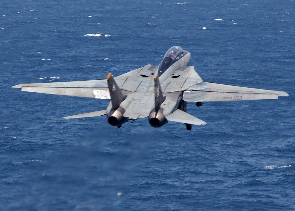 US Navy 040820-N-4374S-003 An F-14B Tomcat assigned to Fighter Squadron One Zero Three (VF-103) launches off the flight deck aboard the aircraft carrier USS John F. Kennedy (CV 67)