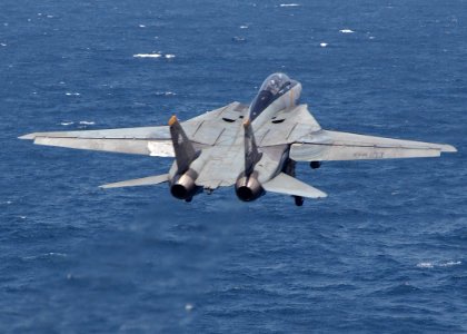 US Navy 040820-N-4374S-003 An F-14B Tomcat assigned to Fighter Squadron One Zero Three (VF-103) launches off the flight deck aboard the aircraft carrier USS John F. Kennedy (CV 67)