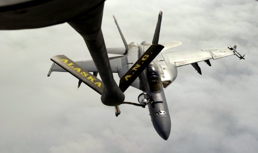 US Navy 040721-F-9528H-012 An F-A-18F Super Hornet refuels during a training mission exercise Cooperative Cope Thunder at Eielson Air Force Base, Alaska