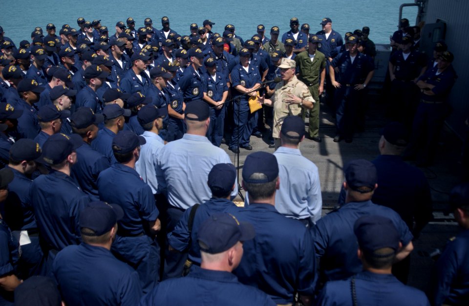 US Navy 040821-N-0962S-012 Master Chief Petty Officer of the Navy (MCPON) Terry Scott speaks to Sailors aboard guided missile cruiser USS Mobile Bay (CG 53) deployed in support of Operation Iraqi Freedom (OIF)