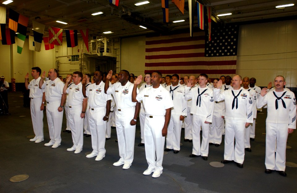 US Navy 040723-F-5586B-014 Sailors aboard USS Ronald Reagan (CVN 76) receive the oath enlistment by Deputy Secretary of Defense Paul D. Wolfowitz, Deputy Secretary of Defense reenlist them
