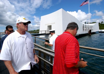 US Navy 040902-N-3019M-003 National Football League (NFL) Hall of Fame quarterback Terry Bradshaw walks to the USS Arizona Memorial during a visit to Pearl Harbor