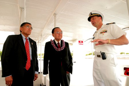 US Navy 040812-N-3228G-001 Commander, Navy Region Hawaii-Commanding Officer, Naval Station Pearl Harbor Capt. Ronald R. Cox speaks with the U.S. Transportation Secretary Norman Mineta, left, and U.S. Sen. Daniel Inouye