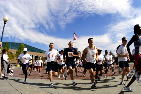 US Navy 040908-N-6477M-049 Sailors assigned to Naval Station Everett and tenant commands participate in a 5-Kilometer POW-MIA run to commemorate those missing and killed in service to our country photo