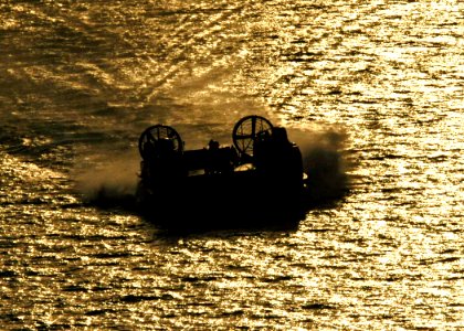 US Navy 040707-N-2972R-085 An Assault Craft Unit Four (ACU-4) Landing Craft Air Cushion (LCAC) transports elements of the 24th Marine Expeditionary Unit (MEU) from the amphibious assault ship USS Kearsarge (LHD 3) to the Kuwait