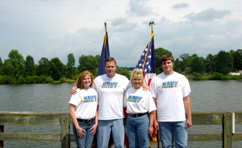 US Navy 040910-N-0000X-001 A family of four from Gadsden, Ala., led by its youngest member 18 year-old Seaman Recruit Brandi McIntyre, far left, joined the U.S. Navy earlier this year
