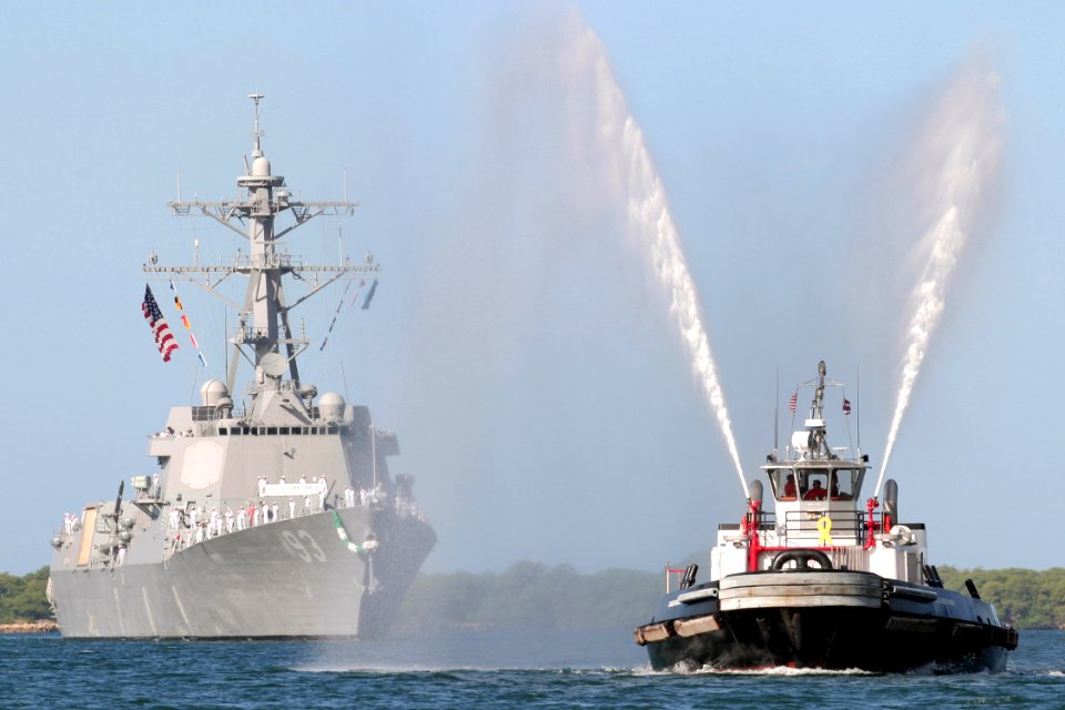 US Navy 040910-N-3228G-001 The Navy's newest and most advanced Arleigh Burke-class guided missile destroyer USS Chung-Hoon (DDG 93) is welcomed into her new homeport of Pearl Harbor, Hawaii, by a tugboat's water can