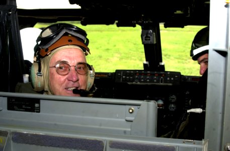 US Navy 040811-D-4876V-001 Secretary of the Navy, Gordon R. England smiles for the camera while sitting in the cockpit of a MV-22 Osprey