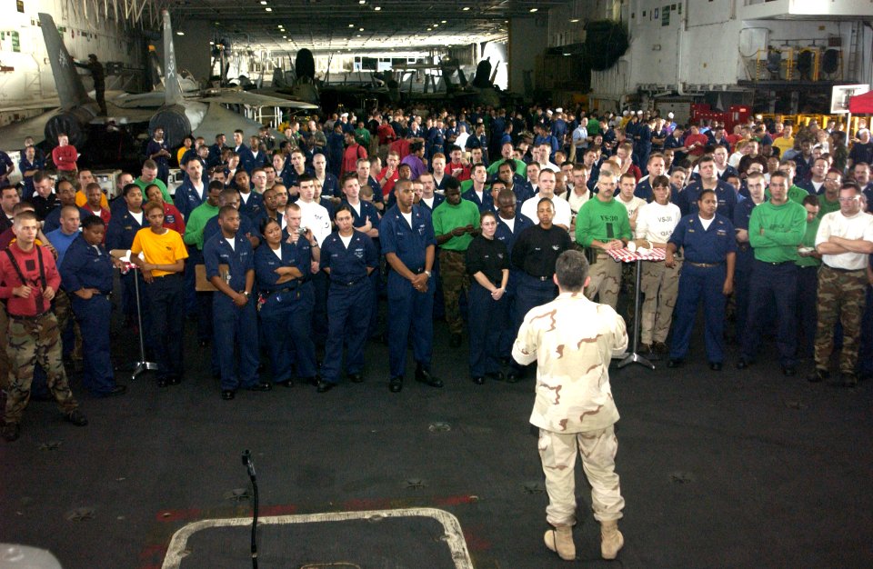 US Navy 040820-N-0962S-007 Master Chief Petty Officer of the Navy (MCPON) Terry Scott speaks to Sailors aboard the aircraft carrier USS John F. Kennedy (CV 67)