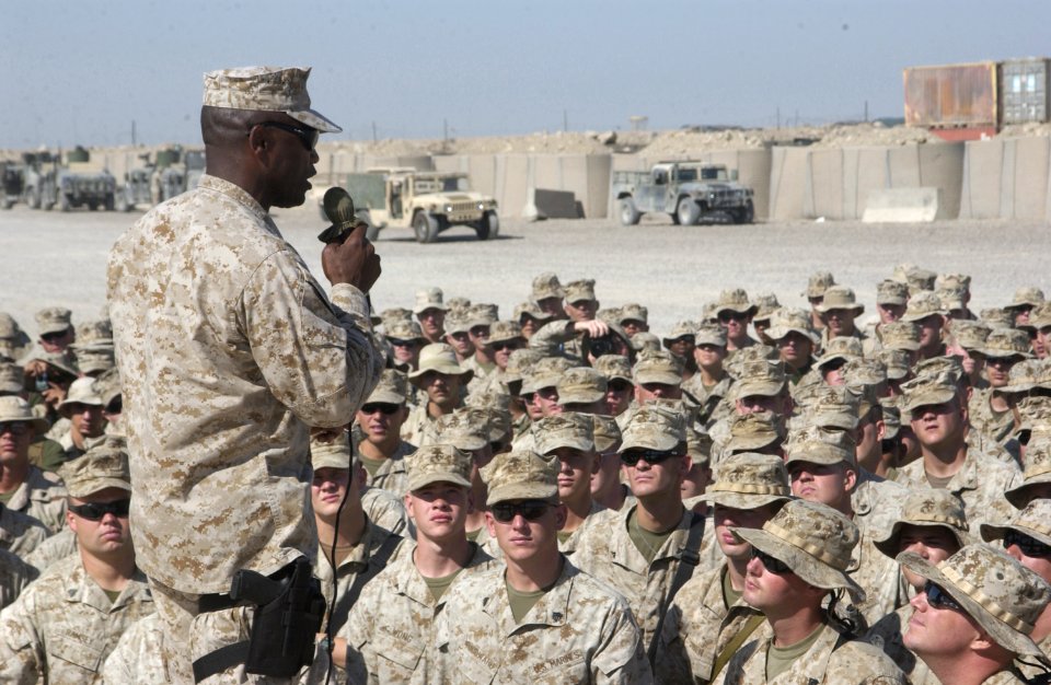 US Navy 040819-N-0962S-029 Sgt. Maj. of the Marine Corps John Estrada speaks to Sailors and Marines supporting Operation Iraqi Freedom (OIF) at Camp Taqaddum, Iraq
