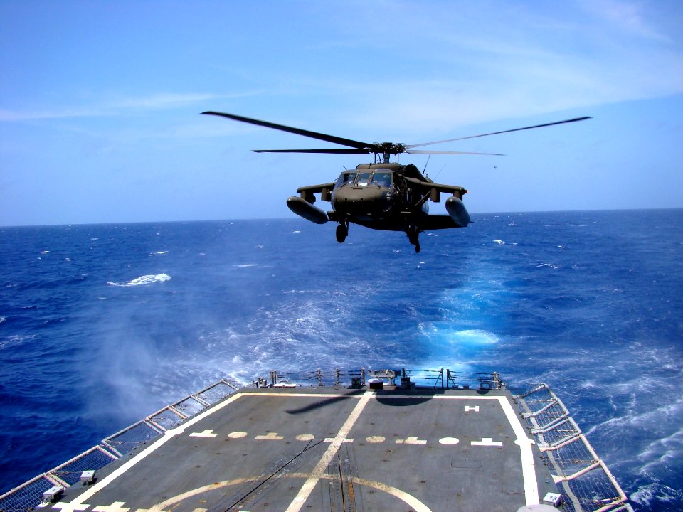 US Navy 041010-N-0000X-001 An Army UH-60 Black Hawk helicopter from the Winged Warriors of 1-228th Aviation Regiment