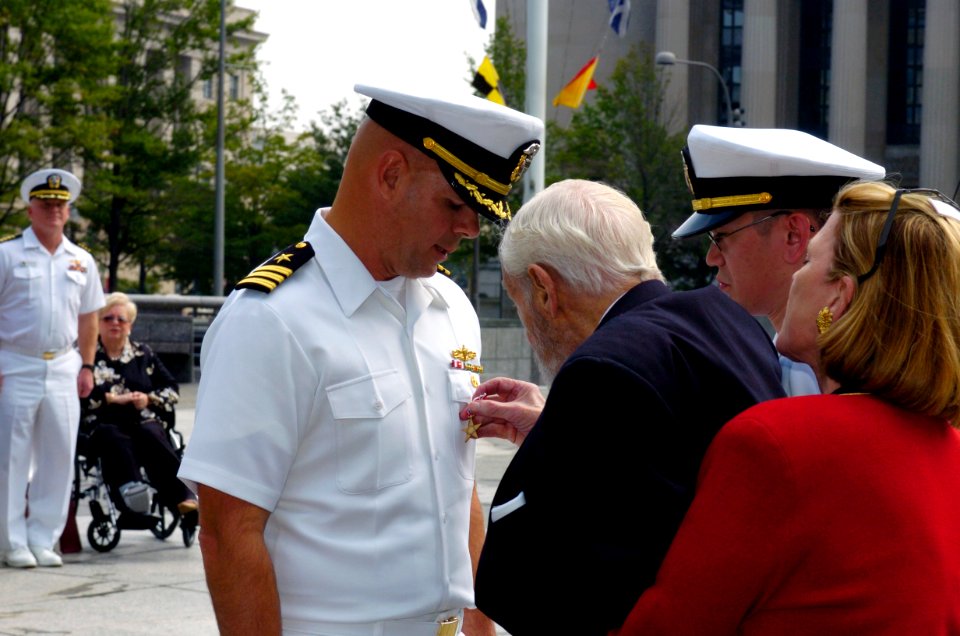 US Navy 040930-N-0295M-001 Ambassador and Former Secretary of the Navy Paul H. Nitze presents a Bronze Star to Cmdr. Michael Hegarty at a ceremony held at the U.S. Navy Memorial in Washington, D.C