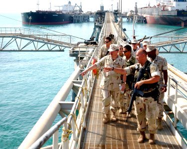 US Navy 040821-N-0401E-039 Master Chief Petty Officer of the Navy (MCPON) Terry Scott and Sgt. Maj. of the Marine Corps John Estrada receive a tour of Al Basrah Oil Terminal, off the coast of Iraq