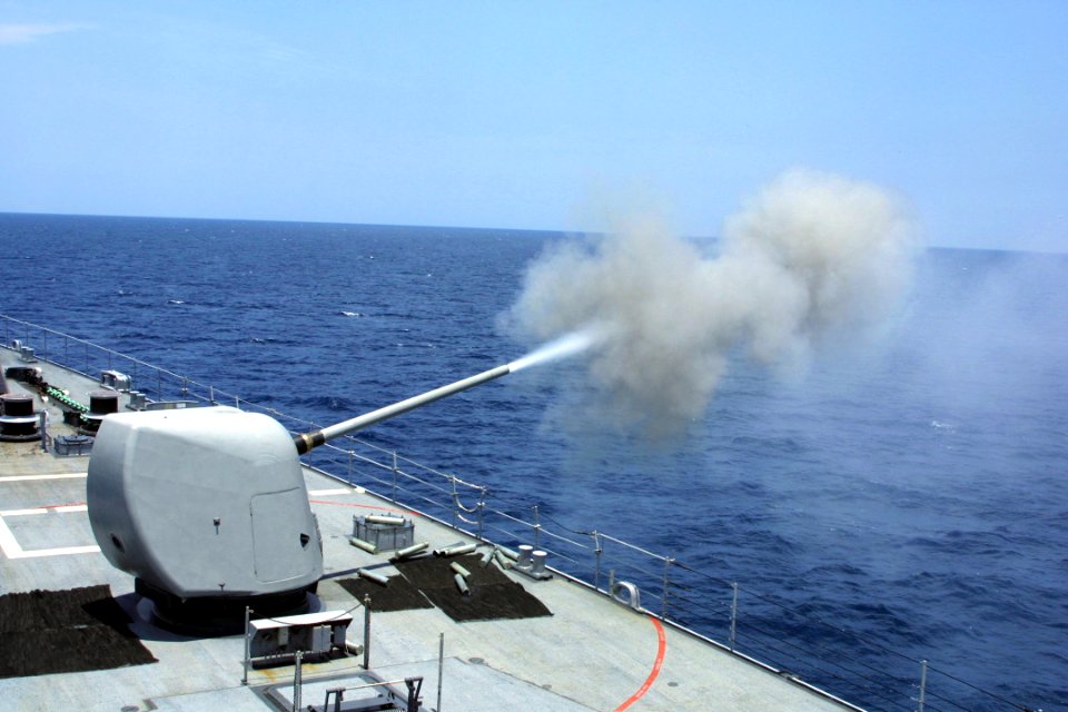 US Navy 040915-N-9376H-001 The guided missile destroyer USS Spruance (DDG 963) fires its 5 54 gun during a three-day exercise in the Central Arabian Gulf