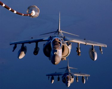 US Navy 041003-F-3188G-216 A pair of U.S. Marine Corps AV-8B II Harriers prepare to refuel during missions over Iraq