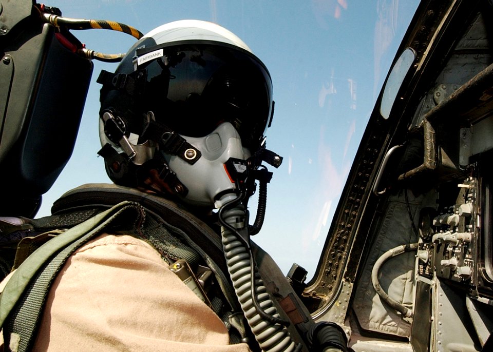 US Navy 040906-N-4374S-002 Lt. Chad Fairbank, an Electronic Countermeasure Officer (ECMO), performs a flight mission in an EA-6B Prowler