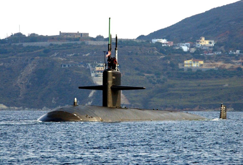 US Navy 041025-N-0780F-086 The Los Angeles-class attack submarine USS Newport News (SSN 750), departs Souda Bay harbor, Greece