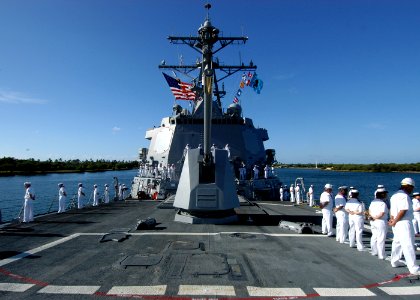 US Navy 040910-N-3019M-003 Sailors man the rails aboard the Navy's newest and most advanced Arleigh Burke-class guided missile destroyer USS Chung-Hoon (DDG 93)