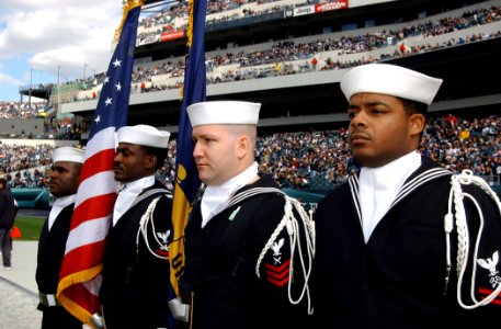 US Navy 041017-N-4729H-027 Sailors standby to parading the colors at opening ceremonies for a National Football League (NFL) game between the Philadelphia Eagles, and the Carolina Panthers at Lincoln Financial Field, Philadelph
