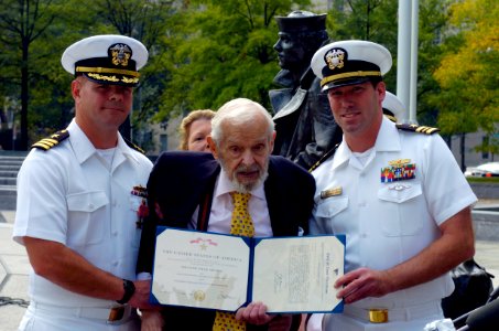 US Navy 040930-N-0295M-002 From left, Cmdr. Michael Hegarty, Former Secretary of the Navy Paul H. Nitze, and Lt. Cmdr. Steve H. Murray, pose after Hegarty was presented a Bronze Star at a ceremony held at the U.S. Navy Memorial