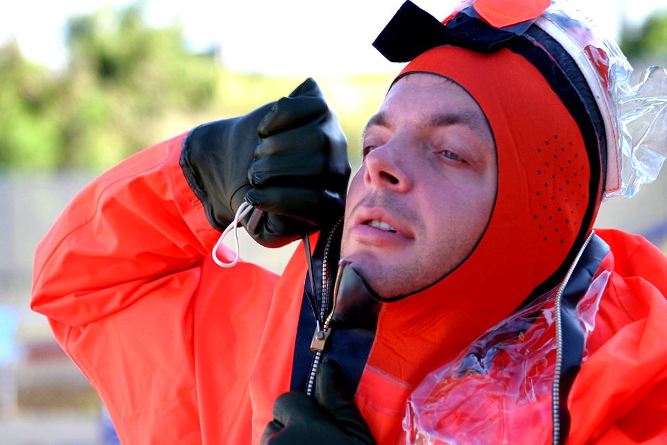 US Navy 041012-N-0879R-001 A Sailor assigned to the Los Angeles-class attack submarine USS Key West (SSN 722), receives training with the MK10 Submarine Escape Immersion Equipment (SEIE)