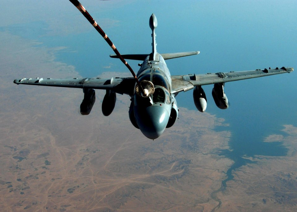 US Navy 041003-F-3188G-077 A U.S. Marine Corps EA-6B Prowler receives fuel during a mission over Iraq from a U.S. Air Force KC-10 Extender