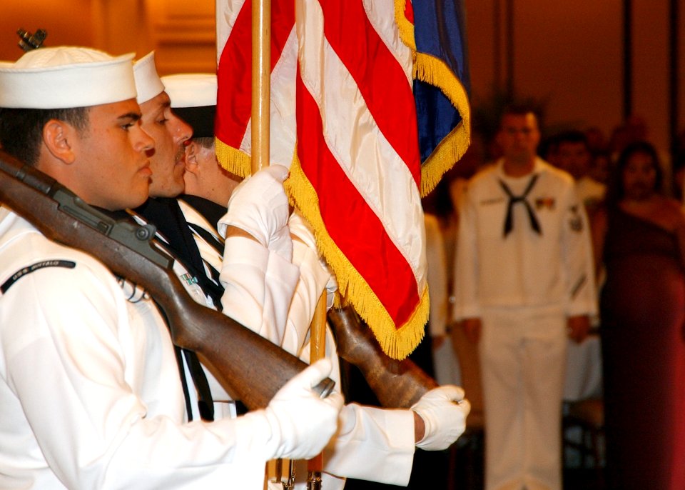 US Navy 041002-N-3019M-001 Naval Station Pearl Harbor color guard parades the colors during the 2004 Enlisted Navy Ball