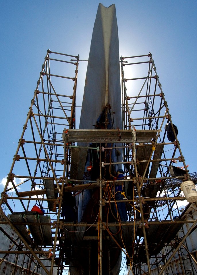 US Navy 041005-N-3019M-002 Marisco Ltd. workers repair the aging hull of the decommissioned Balao-class submarine USS Bowfin (SS 287)