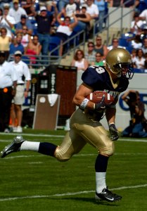 US Navy 040925-N-9693M-003 U.S. Naval Academy Midshipman 2nd Class Marco Nelson runs for a touchdown during the first half of play against Vanderbilt