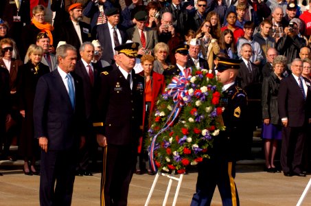 US Navy 041111-G-3024G-787 President George W. Bush and Commanding General, Maj. Gen. Galen B. Jackman pay respects to the unknown servicemen laid to rest at the Tomb of the Unknowns