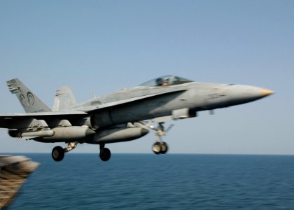 US Navy 041117-N-4374S-008 An F-A-18C Hornet launches from the flight deck of USS John F. Kennedy (CV 67)