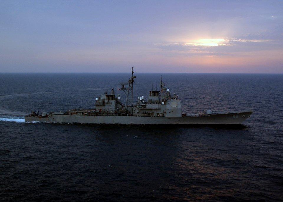 US Navy 041103-N-4374S-002 The guided missile cruiser USS Vicksburg (CG 69) cruises through the Arabian Gulf during sunrise