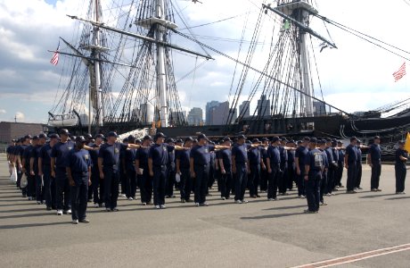 US Navy 040901-N-0962S-109 Chief petty officer (CPO) selectees dress off in formation while preparing for marching drills next to the U.S. Navy's sail ship USS Constitution