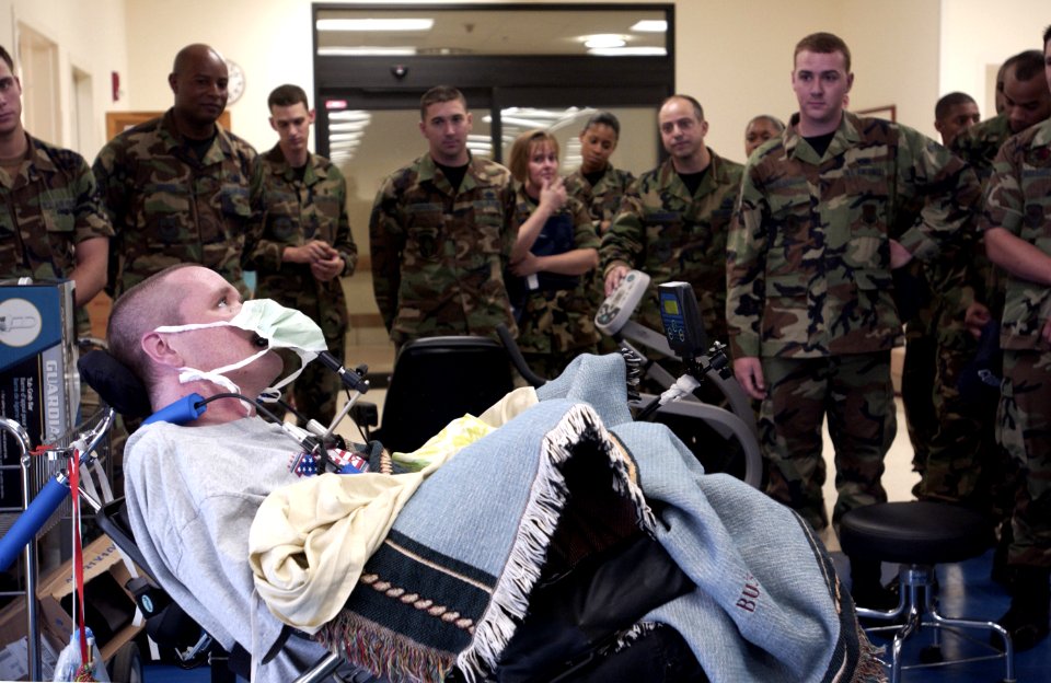 US Navy 041104-F-9550P-001 Petty Officer 3rd Class Pete Herrick, a patient at the James A. Haley Veterans Hospital, Tampa, Fla., talks about his experiences in Iraq