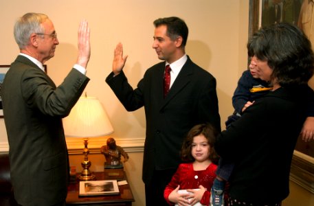 US Navy 041026-N-2568S-001 Secretary of the Navy (SECNAV), Gordon England, swears-in the Honorable Richard Greco, Jr., as Assistant Secretary of the Navy (Financial Management and Comptroller)