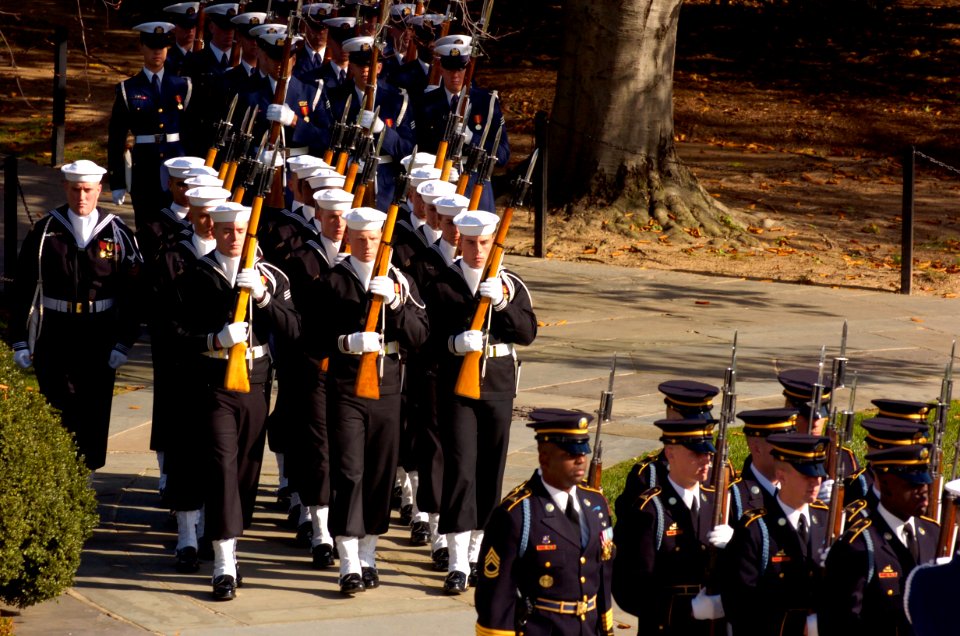US Navy 041111-G-3024G-710 Honor Guardsmen from the Nation's armed services, march to the Tomb of the Unknowns at Arlington National Cemetery, Va., during Veteran's Day ceremonies