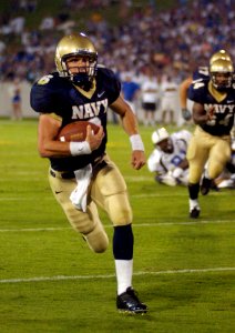US Navy 040904-N-9693M-007 U.S. Naval Academy Midshipman 1st Class Aaron Polanco runs for a touchdown against the Duke Blue Devils to help Navy beat Duke 27-12 in the season opener for both teams