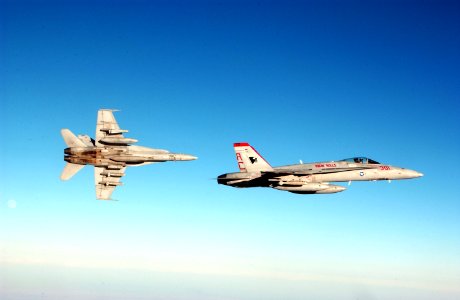 US Navy 041126-F-3188G-178 A pair of F-A-18C Hornets assigned to the Bulls of Strike Fighter Squadron Three Seven (VFA-37), fly over Iraq during a mission in support of Operation Iraqi Freedom (OIF)