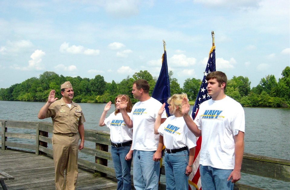 US Navy 040910-N-0000X-002 Naval Recruiting District Montgomery, Commanding Officer Cdr. Greg LaFave swears in the McIntyre family by the Coosa River, Gadsden, Ala