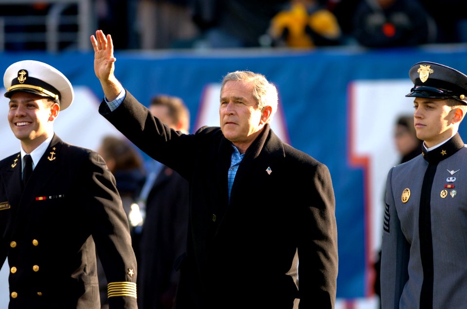 US Navy 041204-N-9693M-014 President Bush waves to crowd during 105th Army Navy game