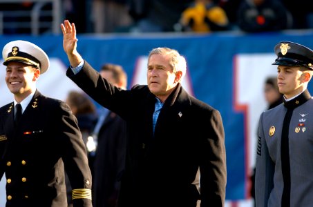 US Navy 041204-N-9693M-014 President Bush waves to crowd during 105th Army Navy game