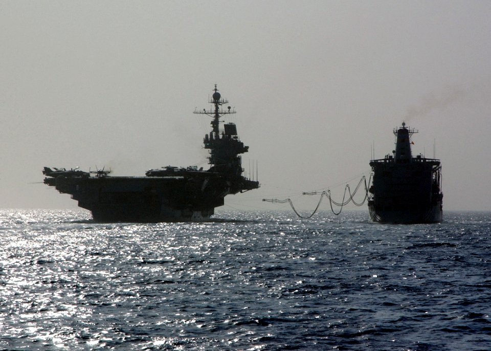 US Navy 041026-N-4374S-001 The conventionally powered aircraft carrier USS John F. Kennedy (CV 67) receives fuel lines from the Military Sealift Command (MSC) underway replenishment oiler USNS Guadalupe (T-AO 200)