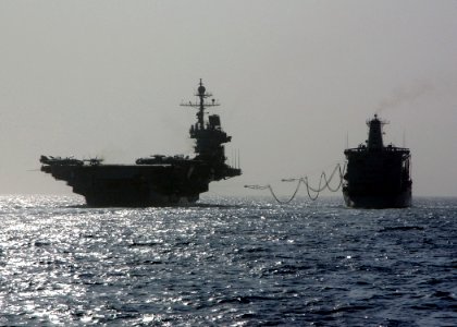 US Navy 041026-N-4374S-001 The conventionally powered aircraft carrier USS John F. Kennedy (CV 67) receives fuel lines from the Military Sealift Command (MSC) underway replenishment oiler USNS Guadalupe (T-AO 200)