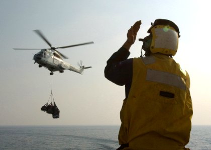US Navy 041112-N-4374S-001 Boatswain's Mate 3rd Class Devin Prichard, a landing signal enlisted (LSE) aboard the guided missile cruiser USS Vicksburg (CG 69)